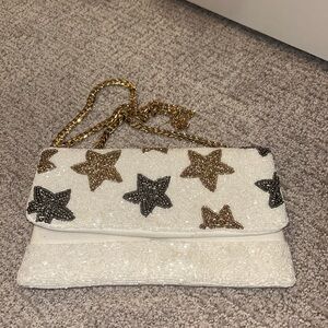 Elegant Star-Embellished White Clutch